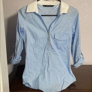Blue shirt with white color